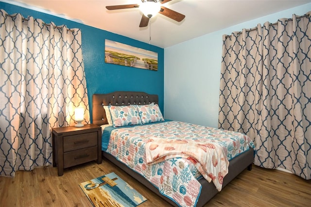 103 Mason Park Dr, Daytona Beach, FL 32117 - bedroom with a ceiling fan and wood finished floors