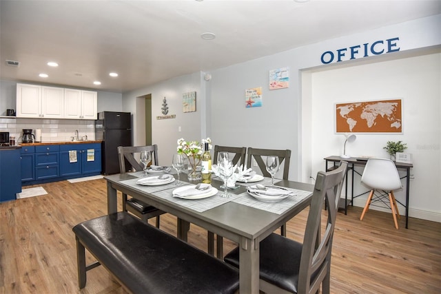 103 Mason Park Dr, Daytona Beach, FL 32117 - dining room featuring recessed lighting, light wood-style flooring, baseboards, and visible vents