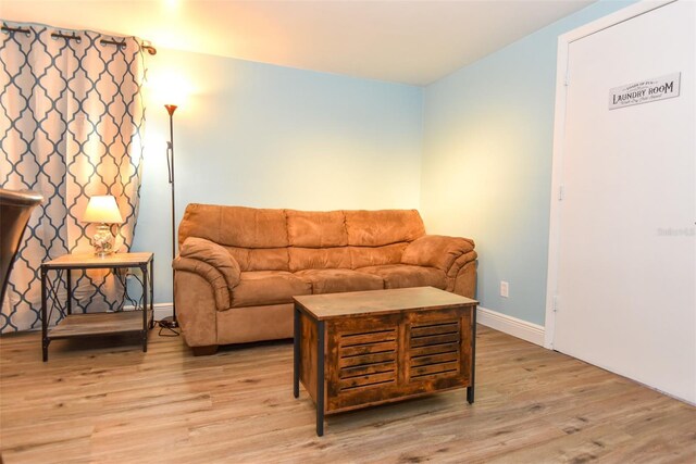 103 Mason Park Dr, Daytona Beach, FL 32117 - living area featuring baseboards and wood finished floors