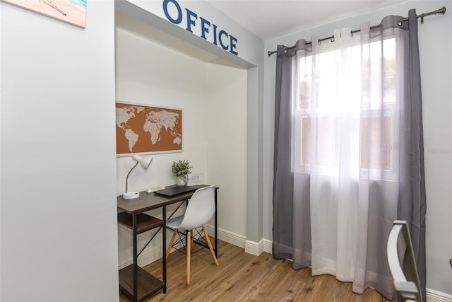 103 Mason Park Dr, Daytona Beach, FL 32117 - office featuring light wood-style floors and baseboards
