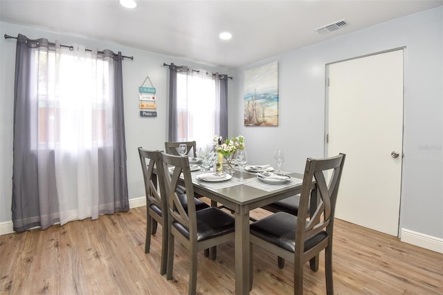 103 Mason Park Dr, Daytona Beach, FL 32117 - dining space with recessed lighting, light wood finished floors, visible vents, and baseboards
