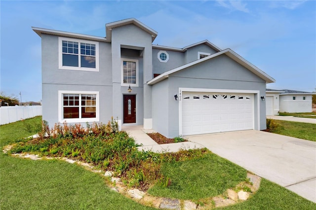 1402 Missouri Pl, Poinciana, FL 34759 - view of front facade featuring an attached garage, driveway, and stucco siding