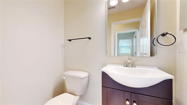 1402 Missouri Pl, Poinciana, FL 34759 - bathroom featuring toilet and vanity