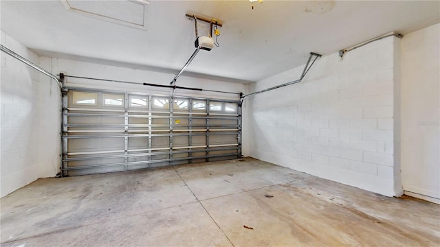 1402 Missouri Pl, Poinciana, FL 34759 - garage with a garage door opener and concrete block wall