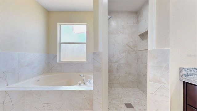 1402 Missouri Pl, Poinciana, FL 34759 - full bathroom with a garden tub, vanity, and a tile shower