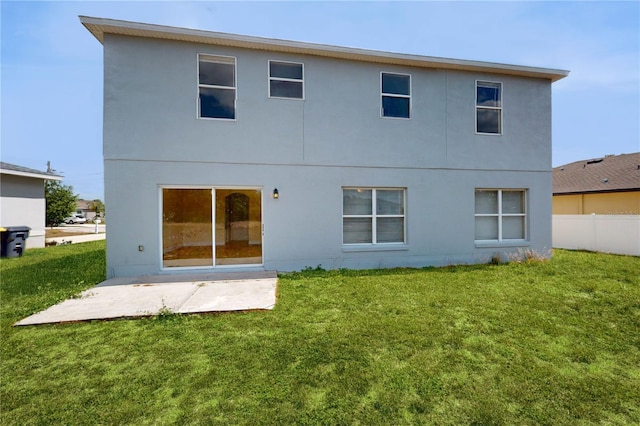 1402 Missouri Pl, Poinciana, FL 34759 - rear view of house featuring a patio and stucco siding