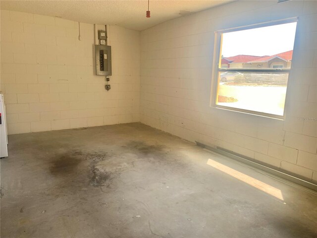 1324 Balboa Ct, The Villages, FL 32159 - garage featuring electric panel and concrete block wall