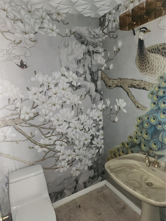 4942 Samoa Cir Unit 5, Orlando, FL 32808 - half bathroom featuring toilet and tile patterned flooring