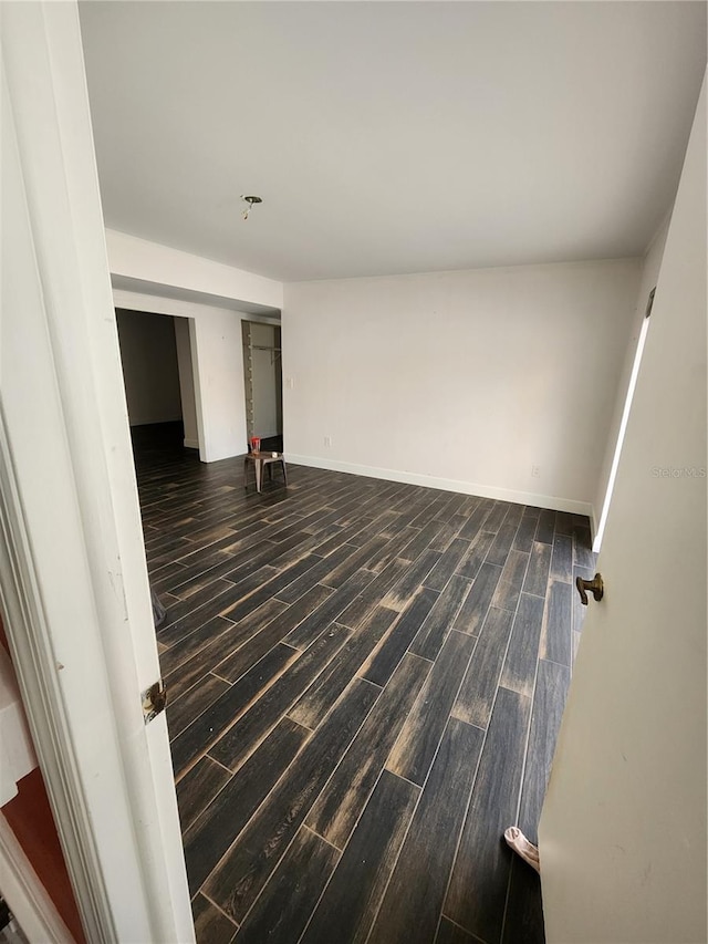 4942 Samoa Cir Unit 5, Orlando, FL 32808 - empty room featuring baseboards and wood finish floors