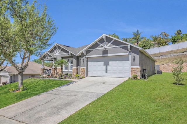 1510 Pier St, Clermont, FL 34711 - craftsman-style home with driveway, stone siding, a front yard, stucco siding, and a garage