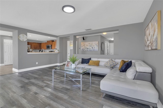 1510 Pier St, Clermont, FL 34711 - living area with recessed lighting, visible vents, wood finished floors, and baseboards