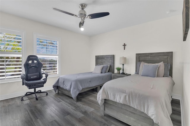 1510 Pier St, Clermont, FL 34711 - bedroom featuring baseboards, wood finished floors, and a ceiling fan