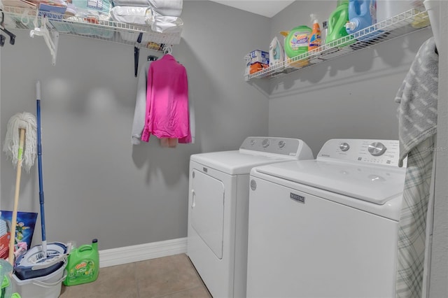 1510 Pier St, Clermont, FL 34711 - laundry room with baseboards, tile patterned flooring, laundry area, and independent washer and dryer