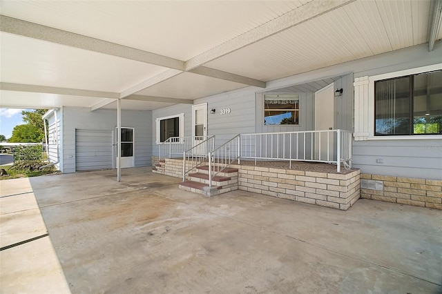 view of patio / terrace with a carport