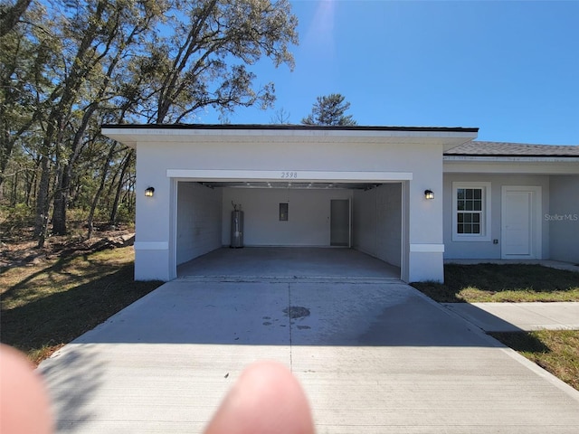 garage with driveway