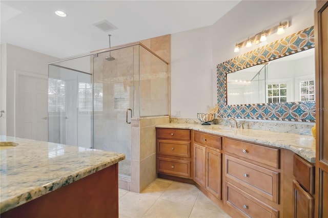 1560 Woodland Ave, Winter Park, FL 32789 - full bathroom featuring a shower stall, tile patterned floors, visible vents, and vanity