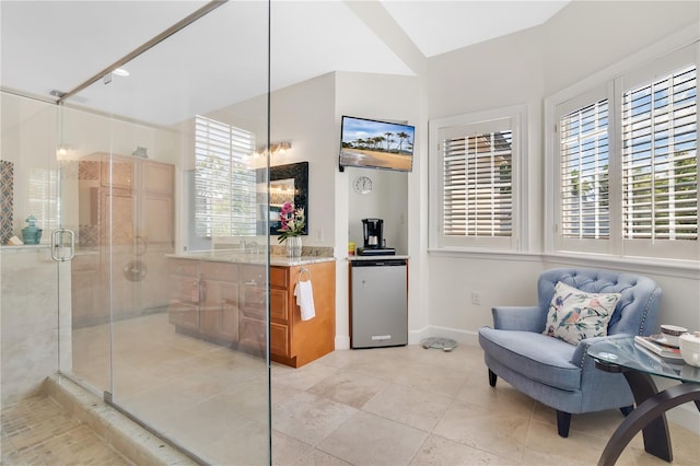 1560 Woodland Ave, Winter Park, FL 32789 - sitting room featuring light tile patterned floors and baseboards
