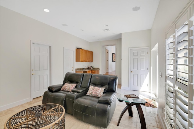 1560 Woodland Ave, Winter Park, FL 32789 - living area with baseboards and recessed lighting
