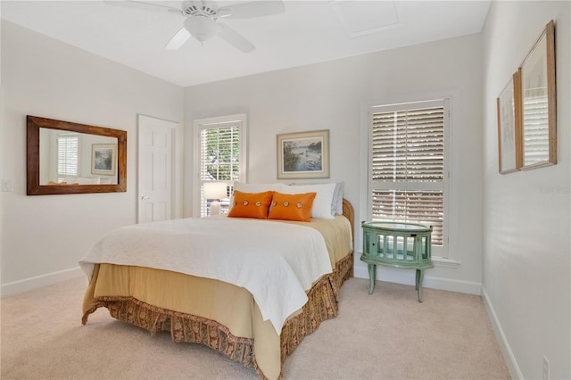 1560 Woodland Ave, Winter Park, FL 32789 - bedroom featuring light colored carpet, baseboards, and a ceiling fan