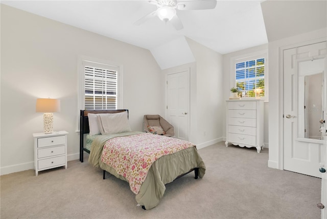 1560 Woodland Ave, Winter Park, FL 32789 - bedroom with light colored carpet, lofted ceiling, ceiling fan, and baseboards