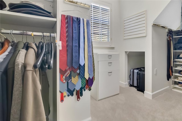 1560 Woodland Ave, Winter Park, FL 32789 - spacious closet featuring carpet flooring