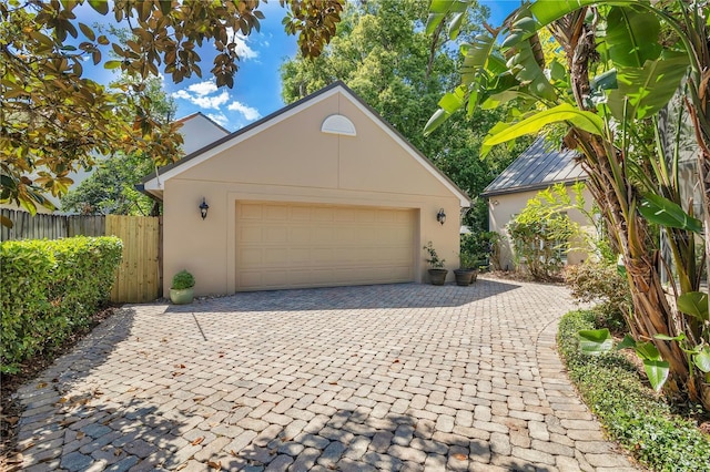 1560 Woodland Ave, Winter Park, FL 32789 - garage with fence