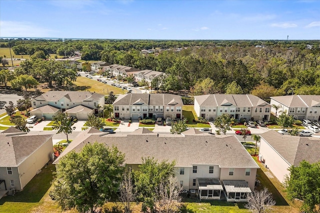 2741 Merrieweather Ln, Kissimmee, FL 34743 - birds eye view of property featuring a residential view and a wooded view