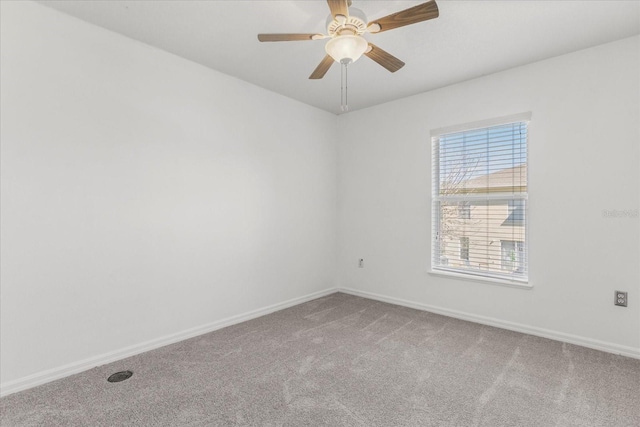 2741 Merrieweather Ln, Kissimmee, FL 34743 - carpeted empty room with baseboards and a ceiling fan