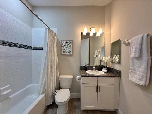 full bathroom with shower / bath combination with curtain, wood finished floors, toilet, vanity, and baseboards