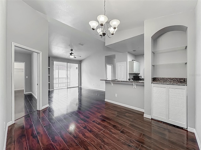 2615 Maitland Crossing Way Unit 9307, Orlando, FL 32810 - unfurnished living room featuring wood finished floors, a chandelier, and a ceiling fan