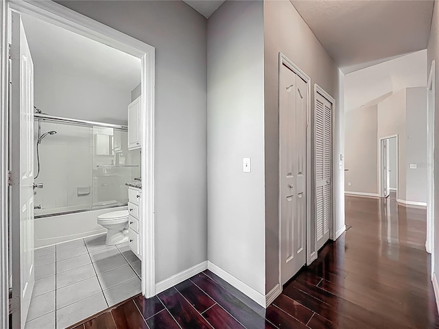 2615 Maitland Crossing Way Unit 9307, Orlando, FL 32810 - full bathroom with enclosed tub / shower combo and wood finished floors