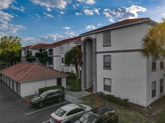 2615 Maitland Crossing Way Unit 9307, Orlando, FL 32810 - view of building exterior featuring uncovered parking