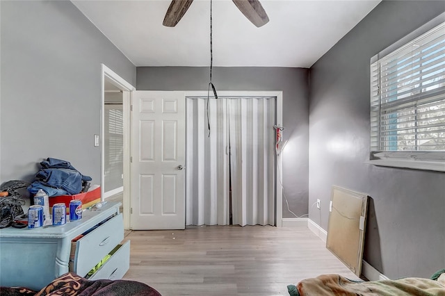 243 W Martin St, Apopka, FL 32712 - bedroom featuring ceiling fan, light wood-style floors, and baseboards