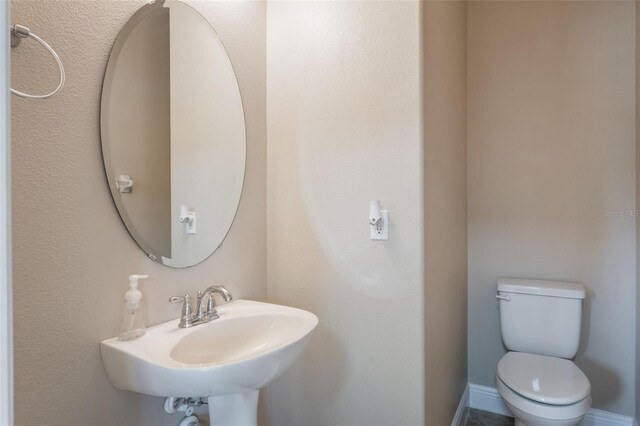 1197 Tallow Rd, Apopka, FL 32703 - half bathroom with a sink and toilet