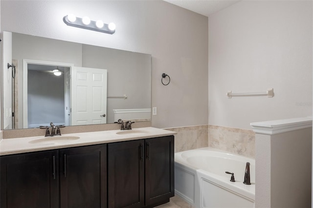 1197 Tallow Rd, Apopka, FL 32703 - bathroom featuring a garden tub and double vanity