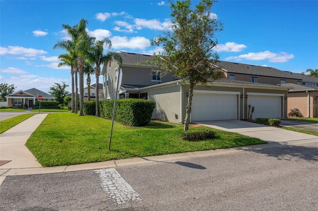 1197 Tallow Rd, Apopka, FL 32703 - view of front of home featuring stucco siding, a front yard, a garage, and concrete driveway