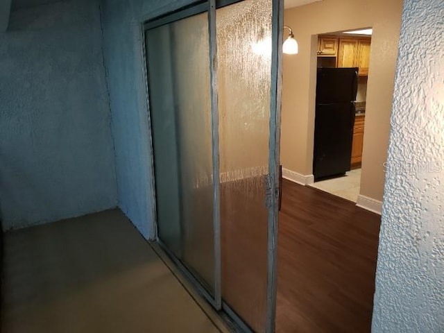 4779 S Texas Ave Unit 4779C, Orlando, FL 32839 - corridor featuring baseboards and light wood-type flooring