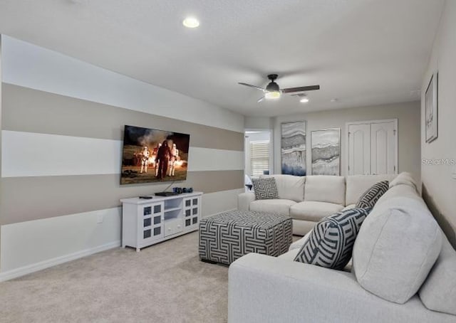 8892 Bengal Ct, Kissimmee, FL 34747 - carpeted living area featuring ceiling fan and baseboards