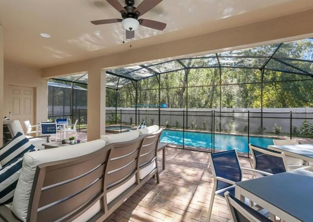 8892 Bengal Ct, Kissimmee, FL 34747 - view of swimming pool featuring an outdoor hangout area, a patio, a fenced backyard, outdoor dining space, and a ceiling fan