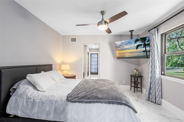 835 Dyson Dr, Winter Springs, FL 32708 - bedroom featuring marble look tile flooring and ceiling fan