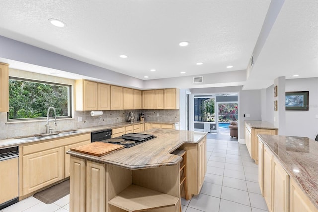 835 Dyson Dr, Winter Springs, FL 32708 - kitchen with light brown cabinets, open shelves, a center island, black appliances, and tasteful backsplash