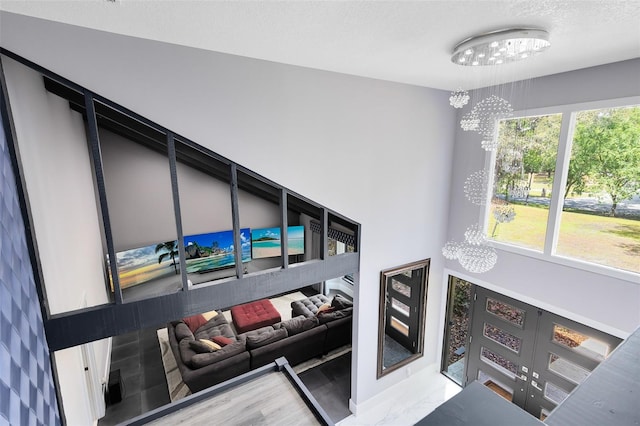 835 Dyson Dr, Winter Springs, FL 32708 - living room featuring a chandelier and a textured ceiling