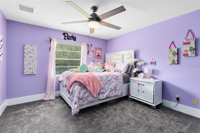 835 Dyson Dr, Winter Springs, FL 32708 - bedroom with dark colored carpet and a ceiling fan