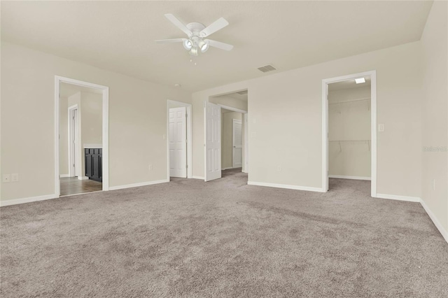 2200 Rapollo Dr, Kissimmee, FL 34741 - interior space featuring carpet, baseboards, visible vents, and a ceiling fan