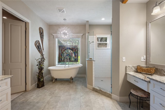 11450 Nellie Oaks Bnd, Clermont, FL 34711 - bathroom featuring vanity, a soaking tub, tiled shower, a chandelier, and tile patterned floors