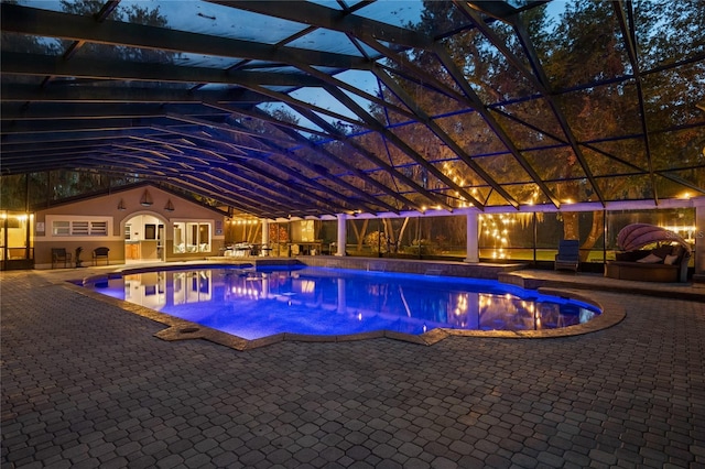11450 Nellie Oaks Bnd, Clermont, FL 34711 - swimming pool with a patio, a hot tub, and glass enclosure