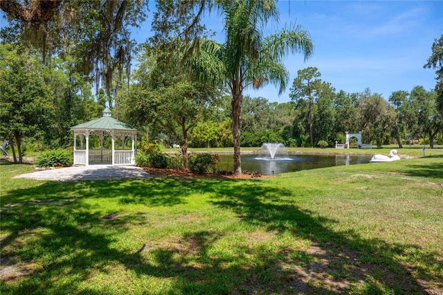 11450 Nellie Oaks Bnd, Clermont, FL 34711 - view of grassy yard with a gazebo and a water view
