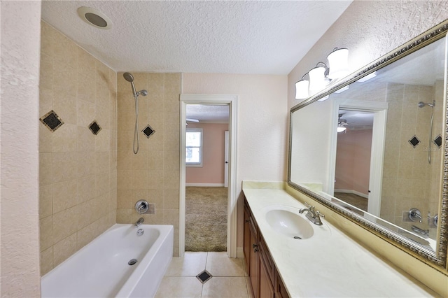 426 S Lakemont Ave, Winter Park, FL 32792 - bathroom with shower / bathing tub combination, vanity, a textured ceiling, tile patterned floors, and ceiling fan