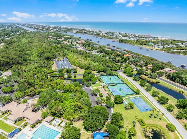 drone / aerial view with a residential view and a water view
