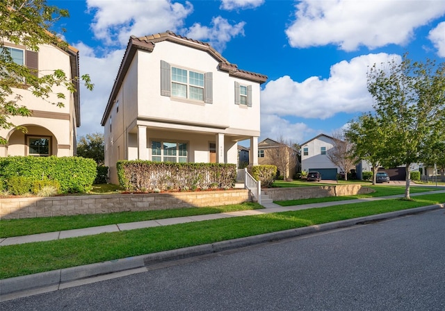 9330 Meadow Hunt Way, Winter Garden, FL 34787 - view of front facade featuring stucco siding and a tiled roof